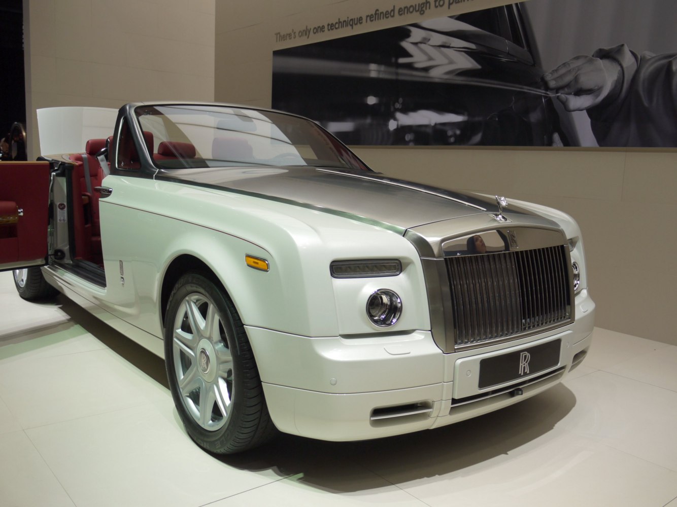 Front grille and open convertible interior with door open