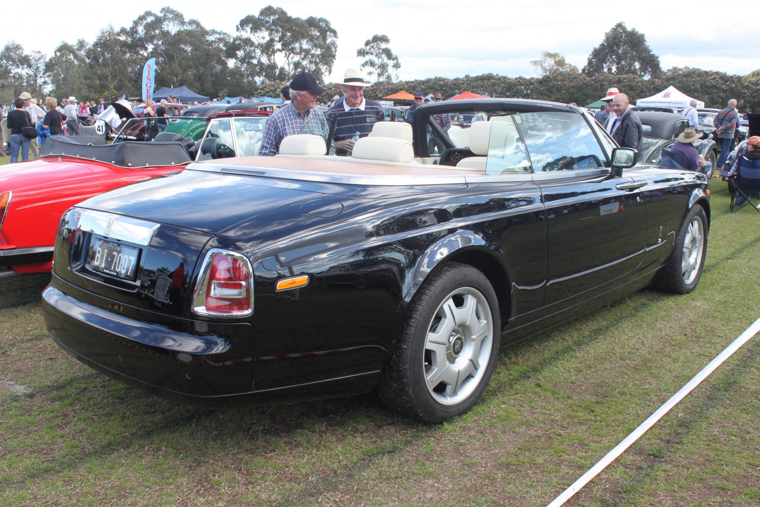 Convertible rear view with white leather seats