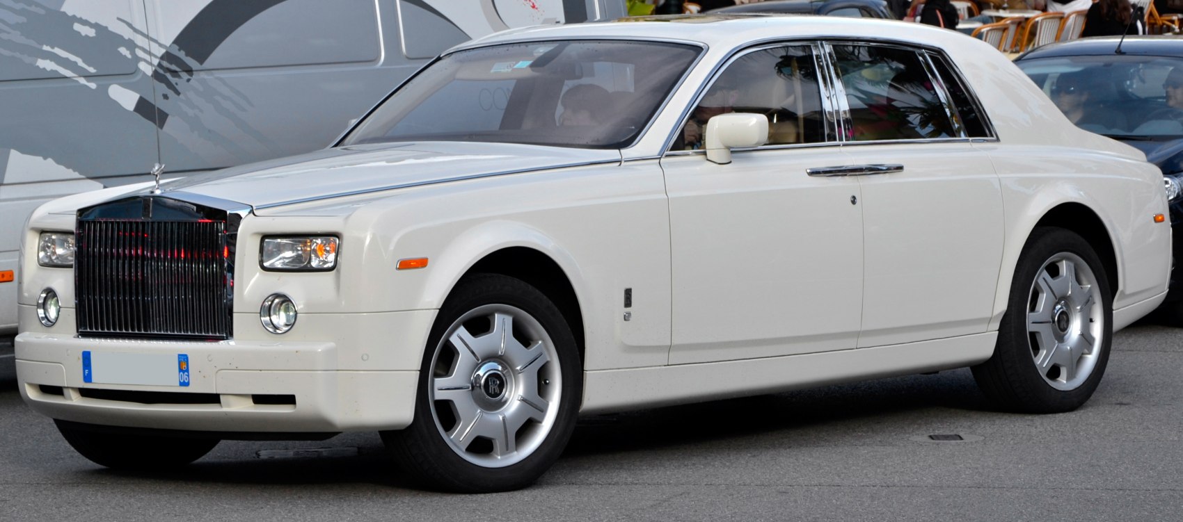Luxury sedan with classic front grille and chrome trim