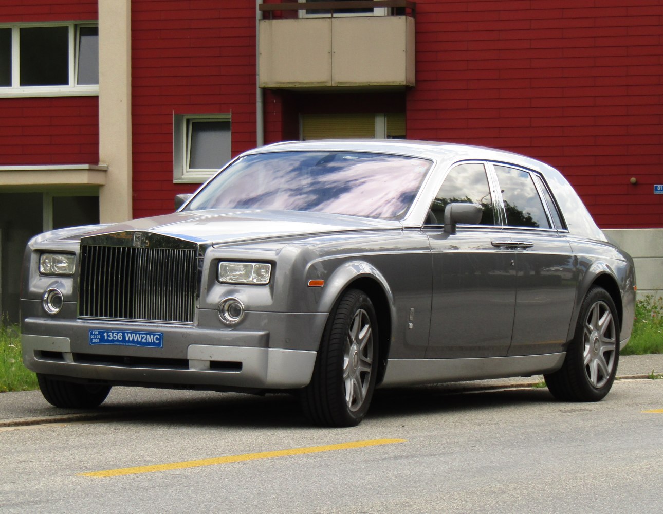 Classic luxury front grille and rectangular headlights.