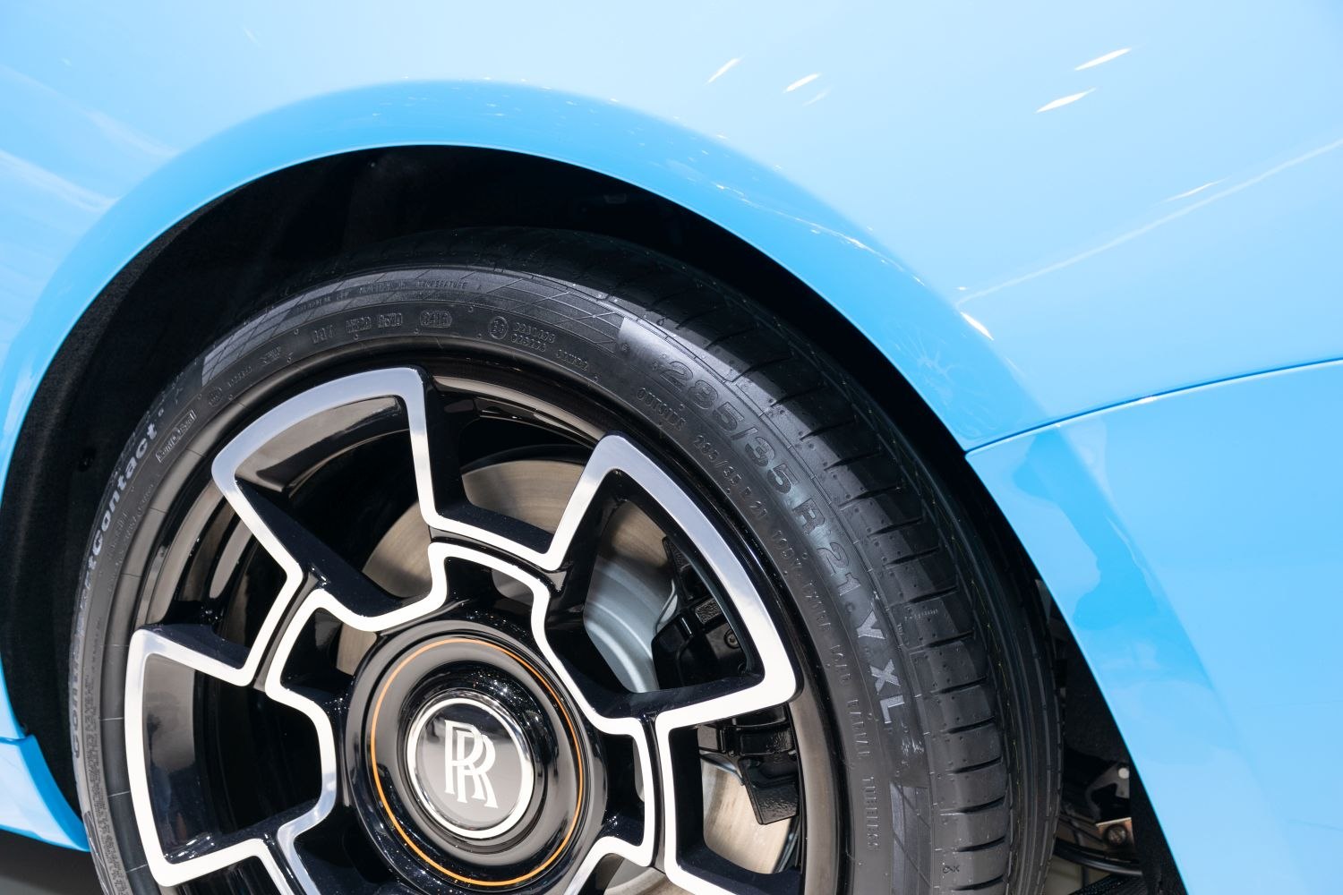 Alloy wheel and tire close-up with detailed rim design