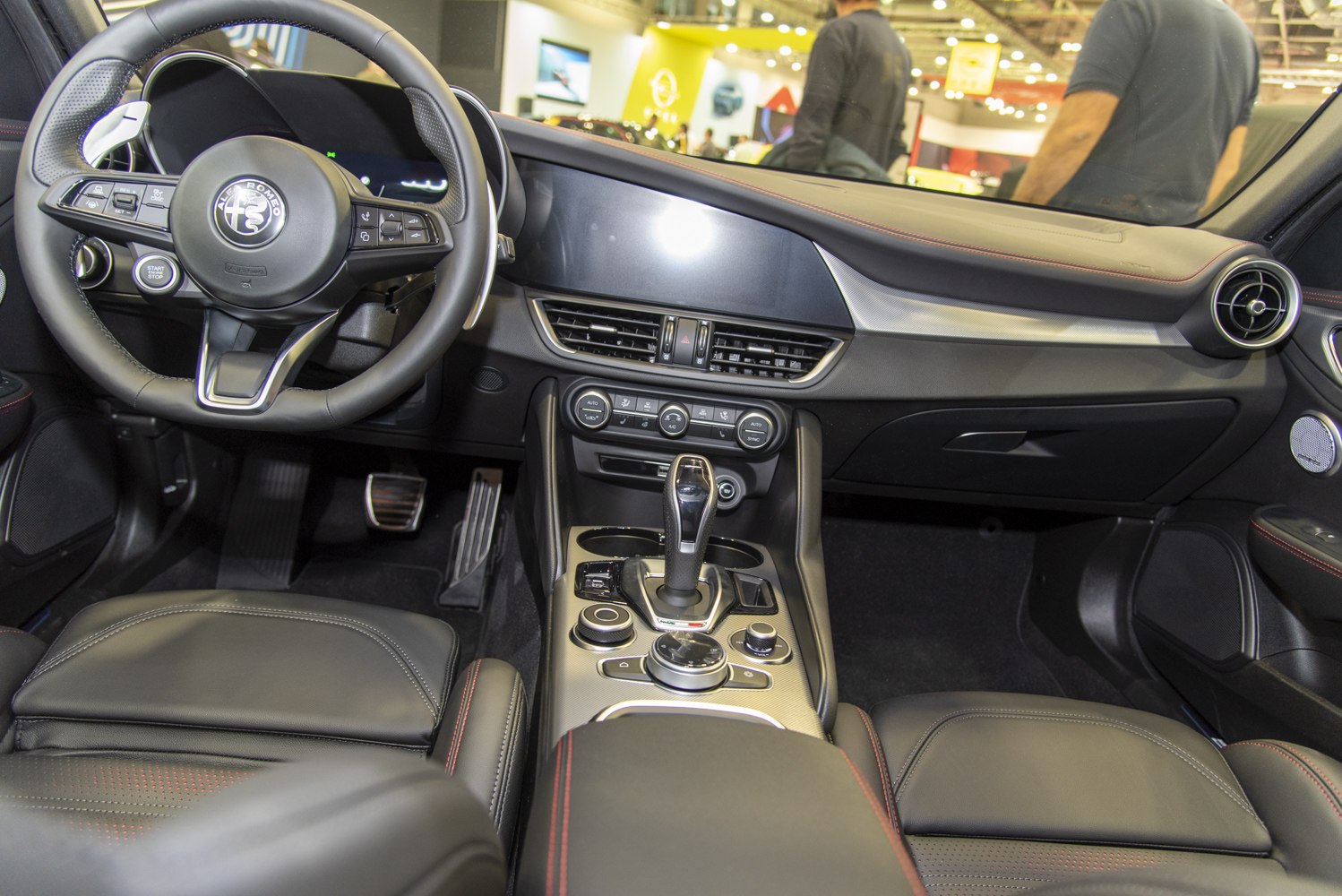 Modern steering wheel and center console with gear shifter and climate controls