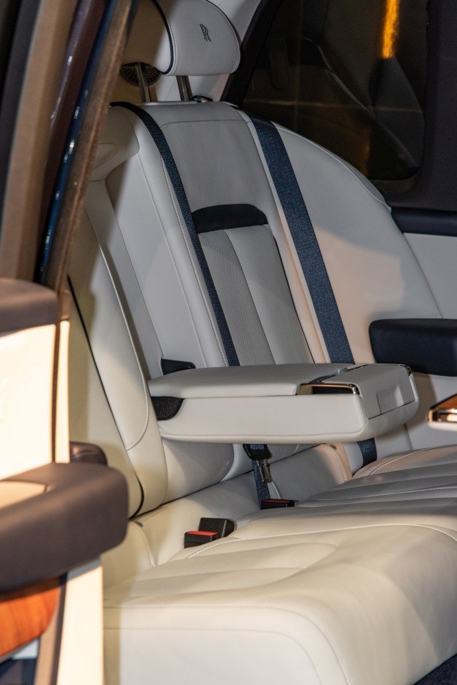 Luxurious rear leather seat with armrest and seatbelt