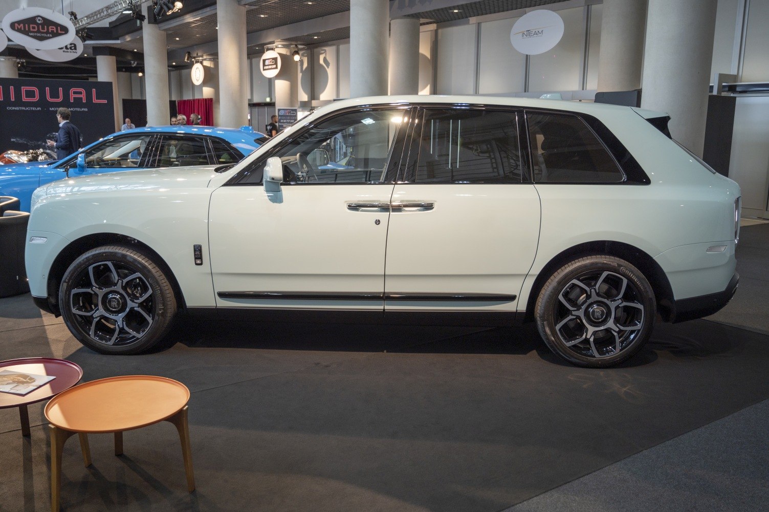 Side profile of luxury SUV with large alloy wheels and smooth design