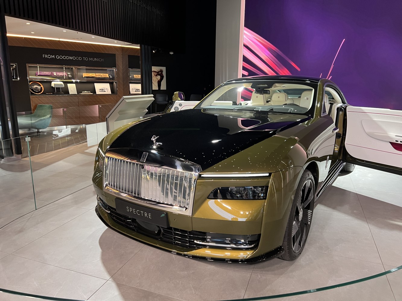 Front grille, LED headlights, and open door revealing premium interior