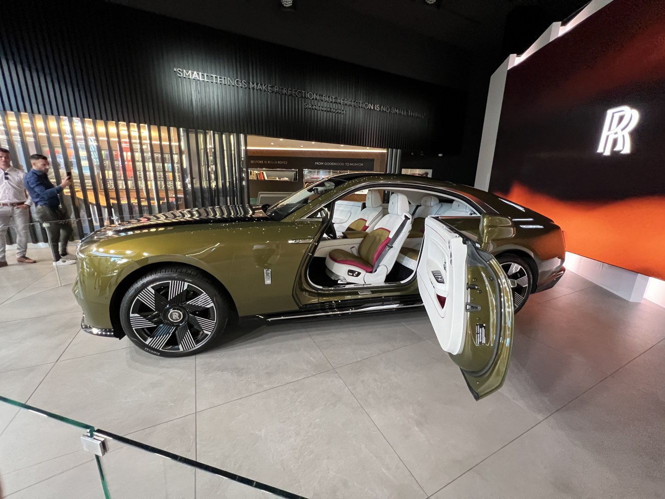 Luxury car with open door showing premium interior and stylish exterior design