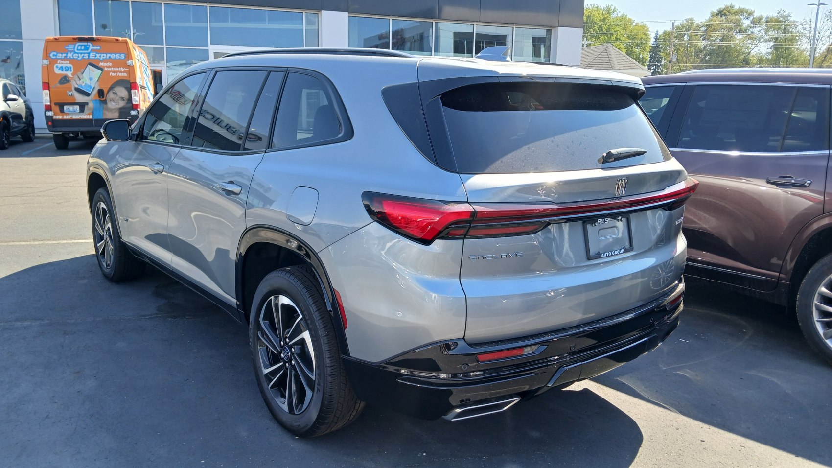 Rear-side view featuring sleek taillights and sporty alloy wheels.