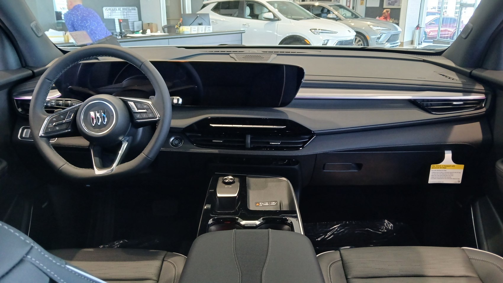 Modern dashboard and steering wheel with digital display and integrated controls