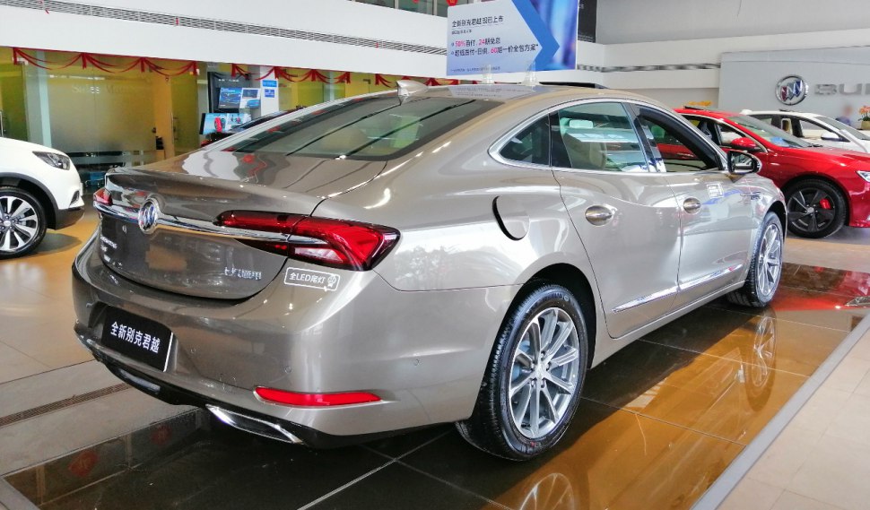 Rear and side view with LED taillights and alloy wheels of a sedan