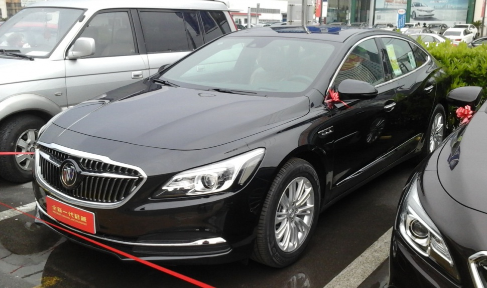 Front grille and headlights of a 2017 sedan.