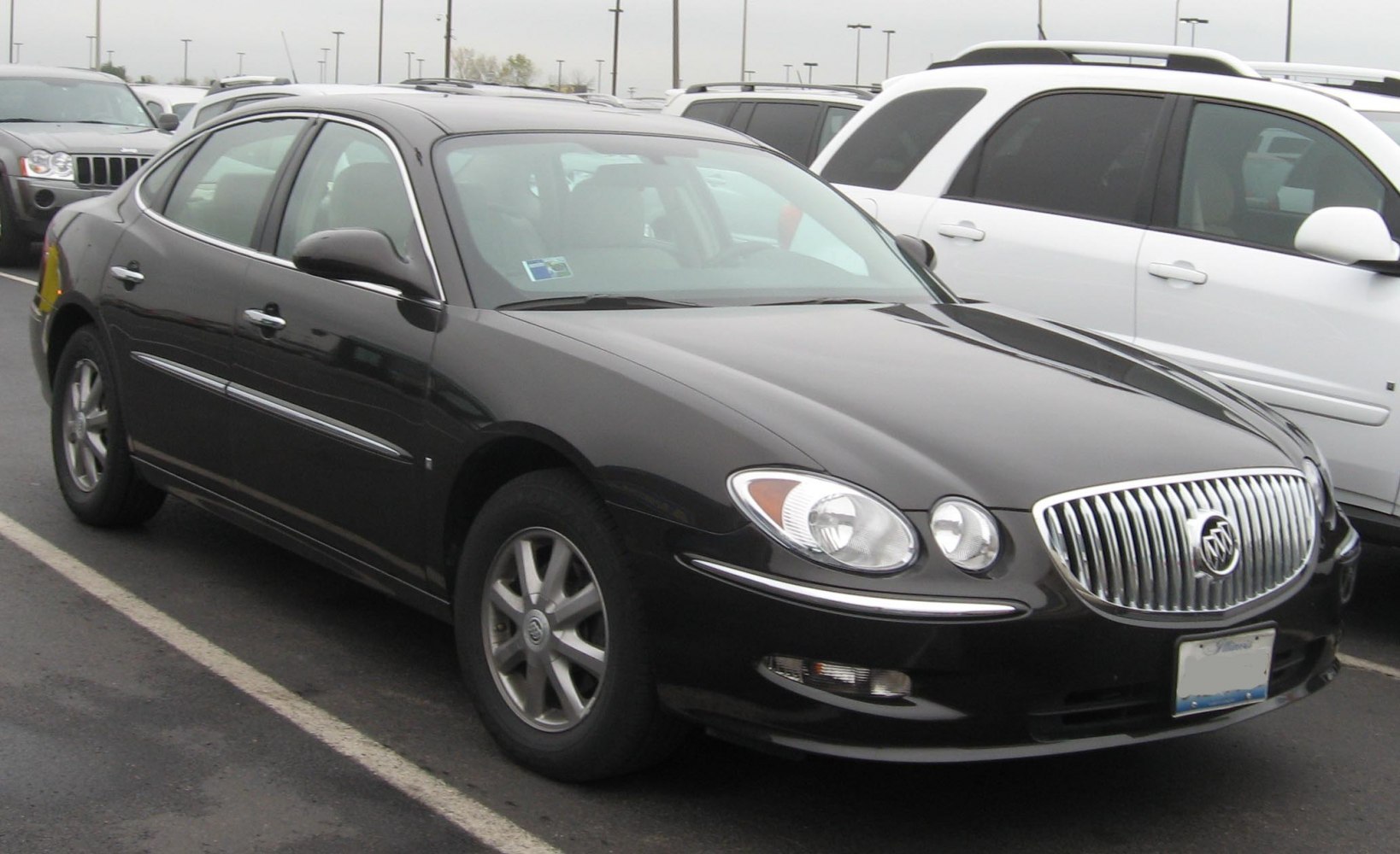 Front and side view with signature grille and headlight design