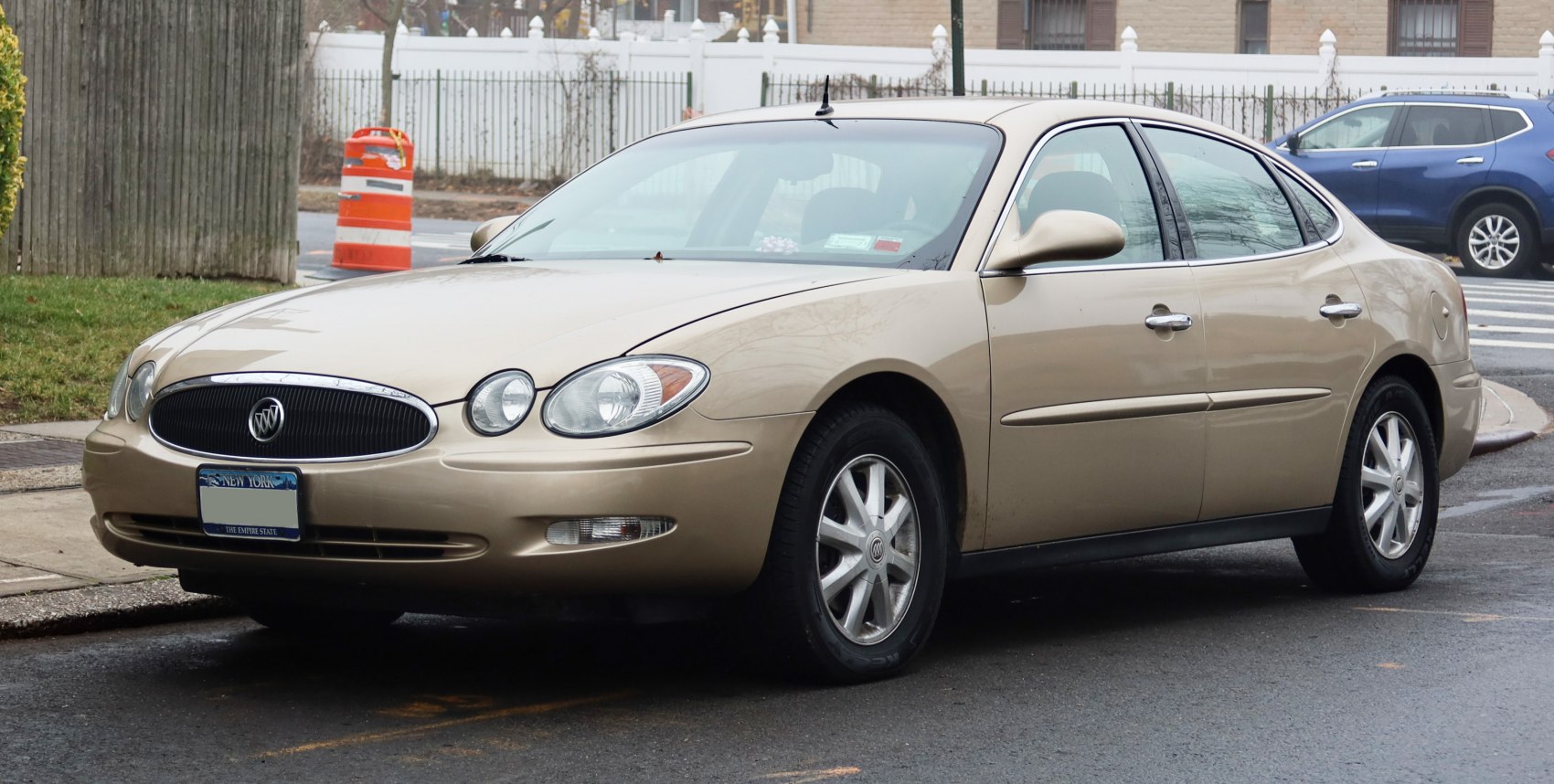 Front side view with oval headlights and smooth aerodynamic design