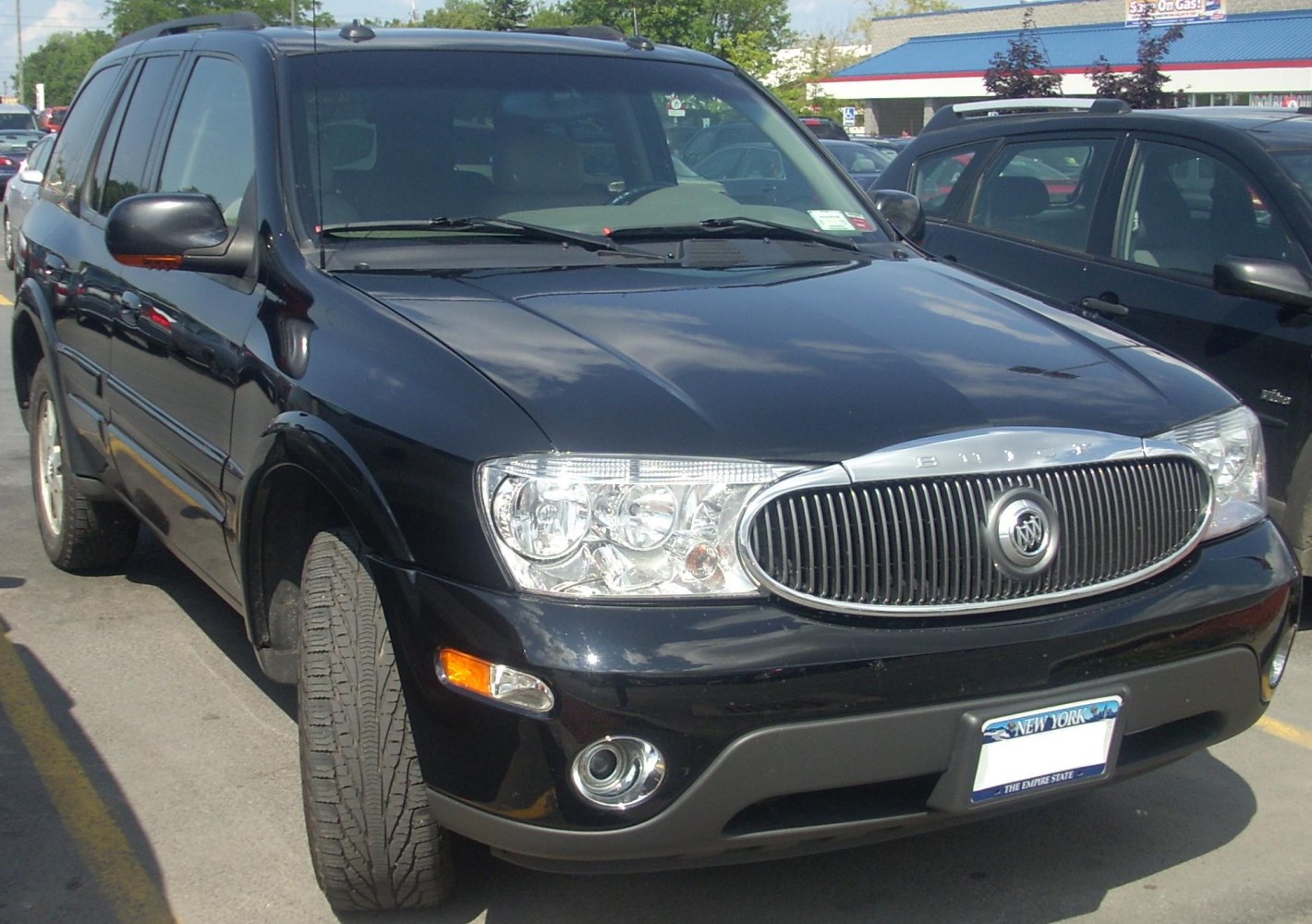 Front view showcasing the distinctive grille and headlights of an SUV.