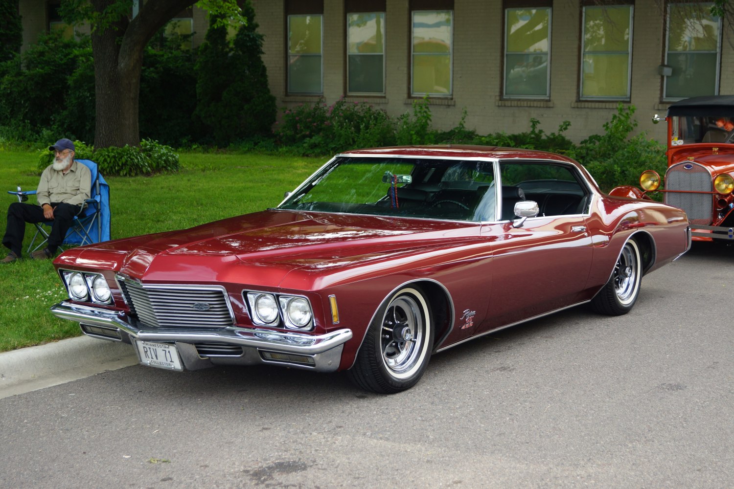 Front view with quad headlights and chrome grille on a vintage 1970s vehicle