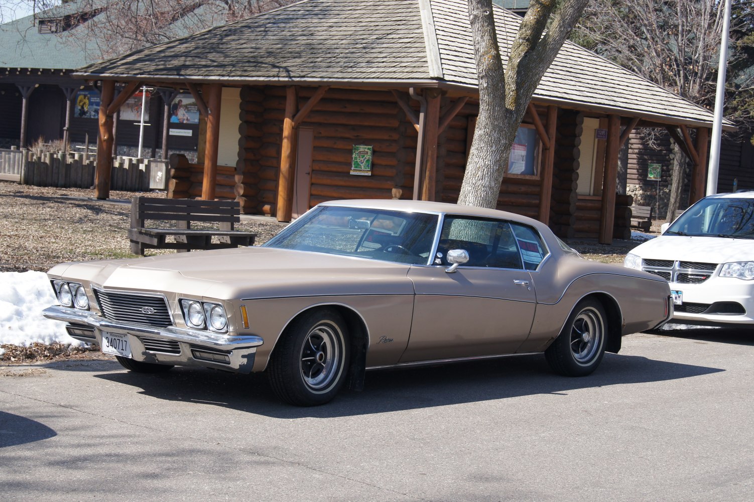 Classic 1971 car with dual headlights and coupe body