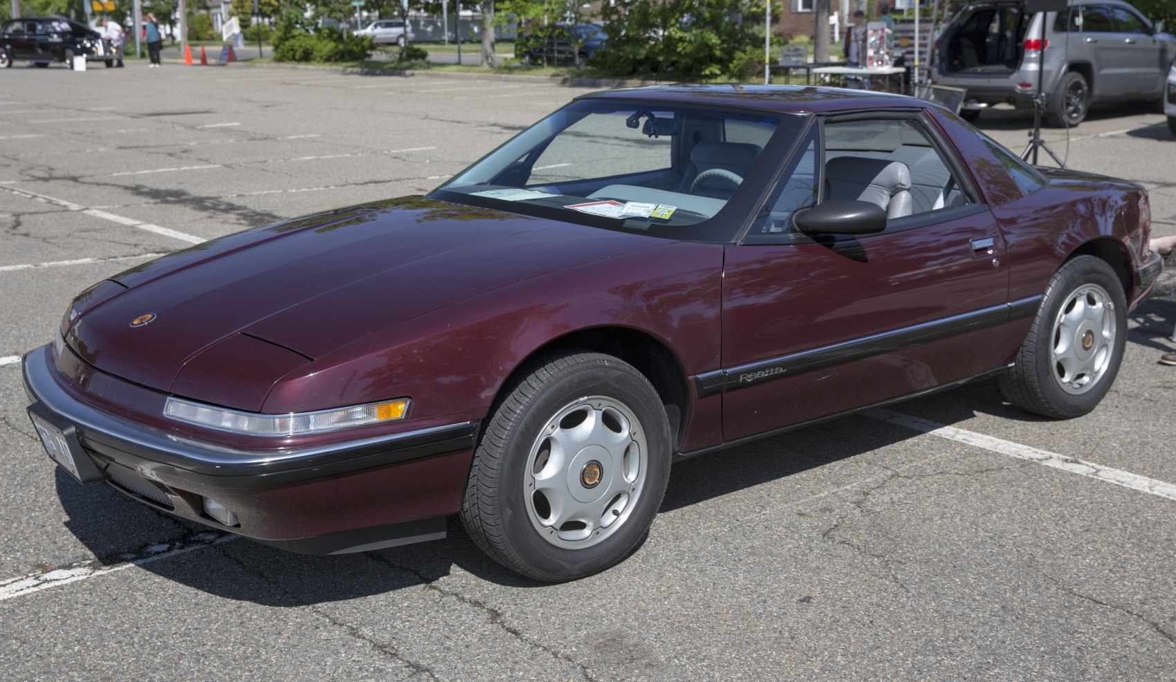 Coupe with pop-up headlights and sleek aerodynamic body