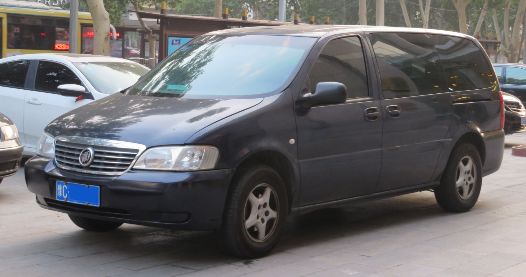 Black MPV with sliding doors and alloy wheels