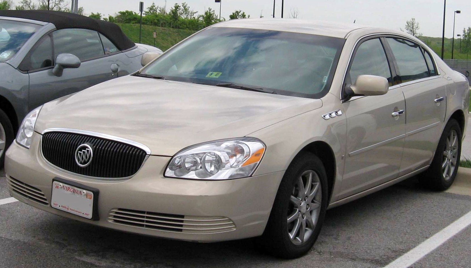 Front and side view with chrome grille and headlight assembly