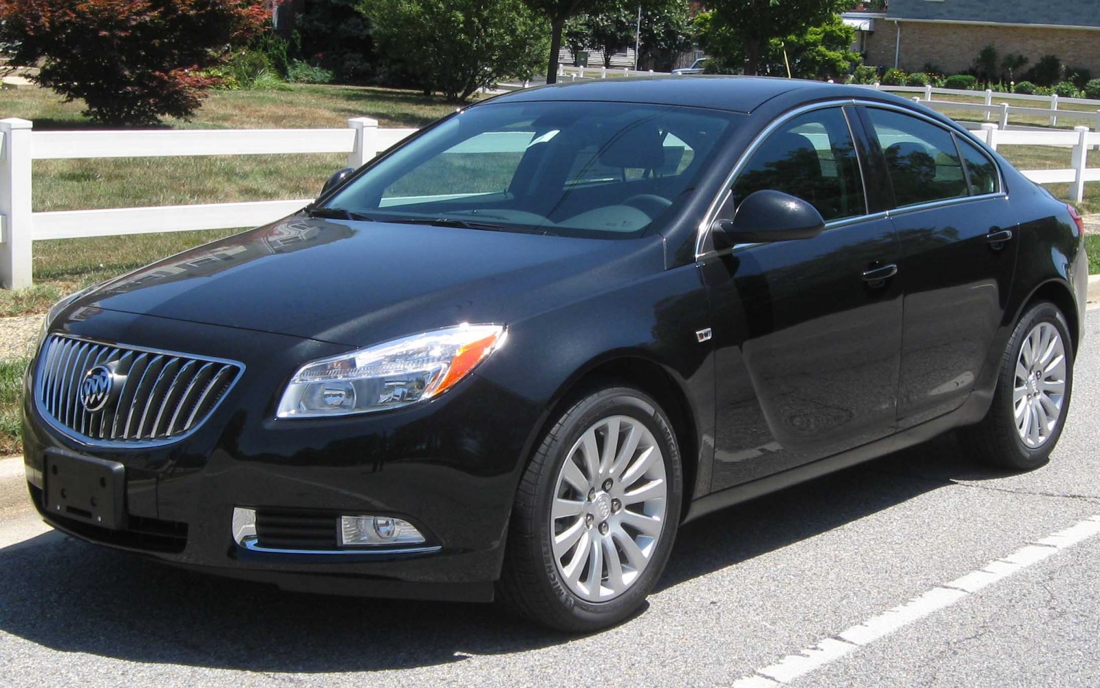 Front side view with chrome grille and headlights