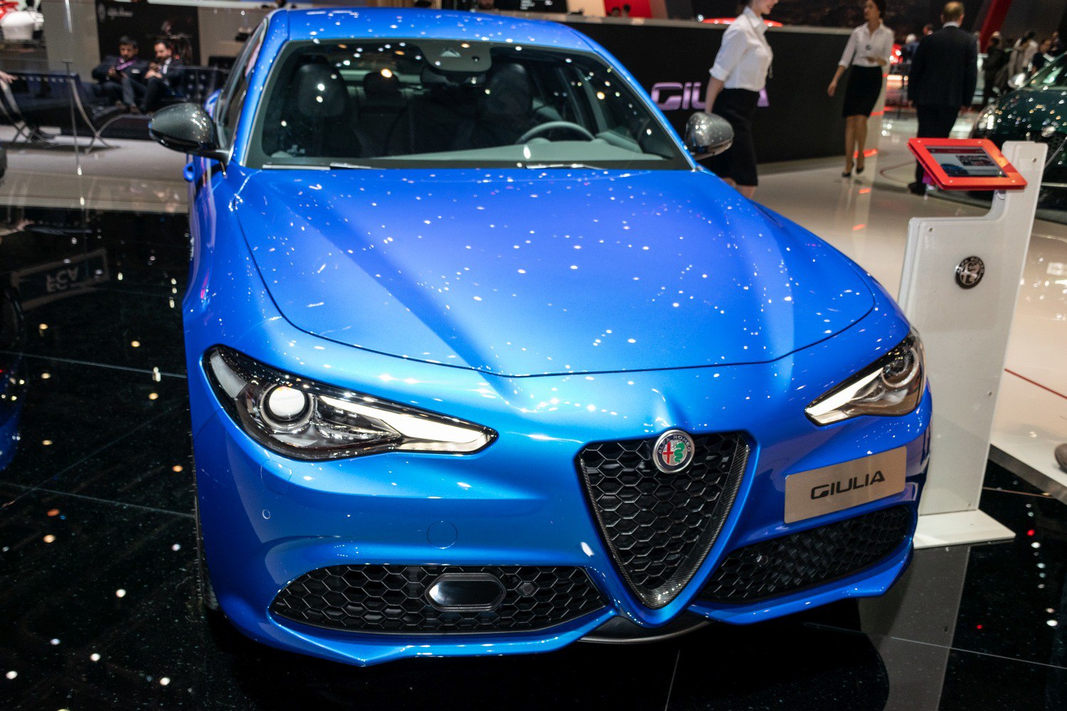 Front end view with triangular grille and modern headlight design