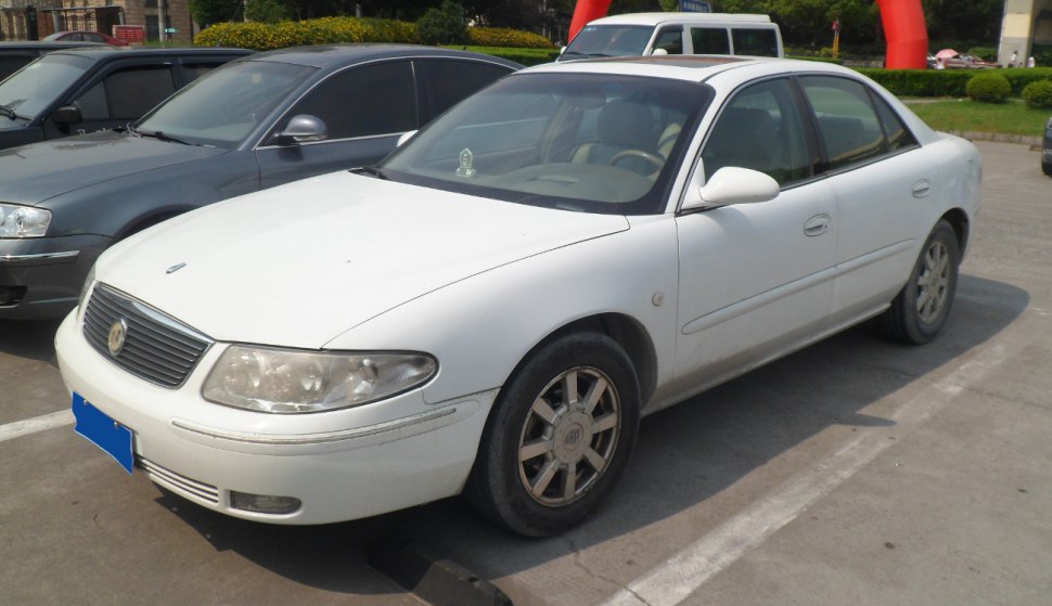 Front left exterior view of a four-door sedan with alloy wheels