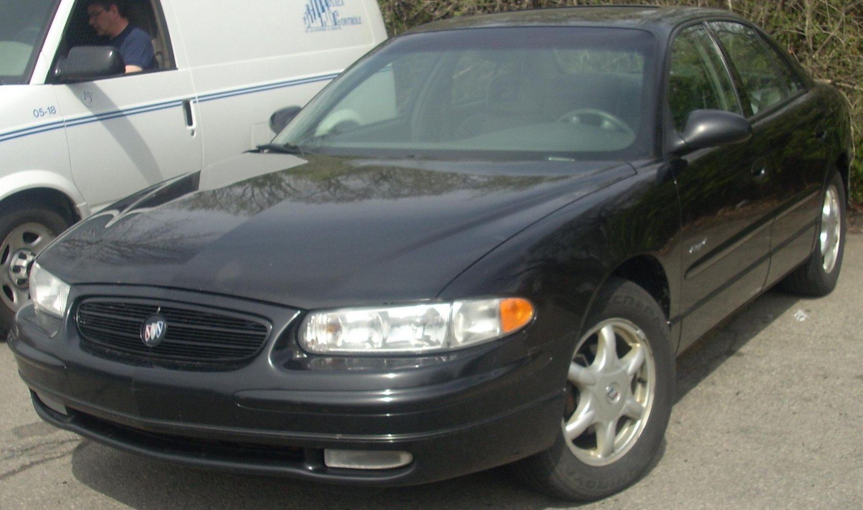 Front angled view with dual-section headlights and amber turn signals