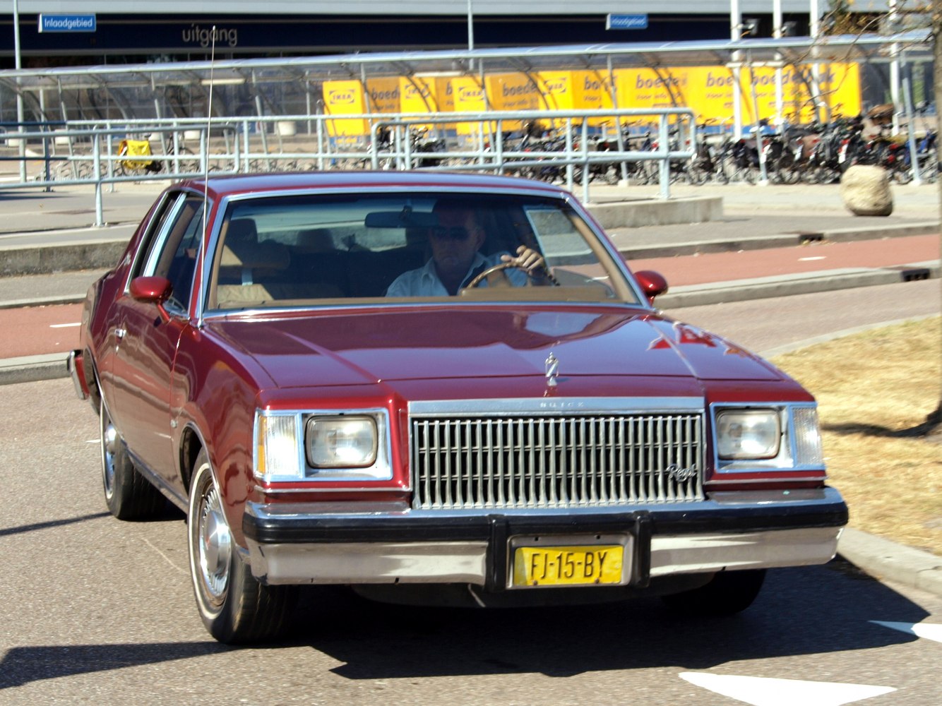 Vintage sedan front with rectangular headlights and classic grille