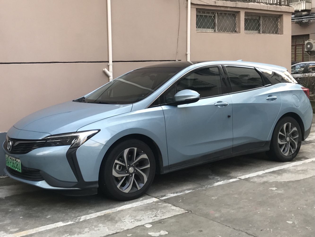 Side view of modern facelift hatchback with aerodynamic design and distinct headlights