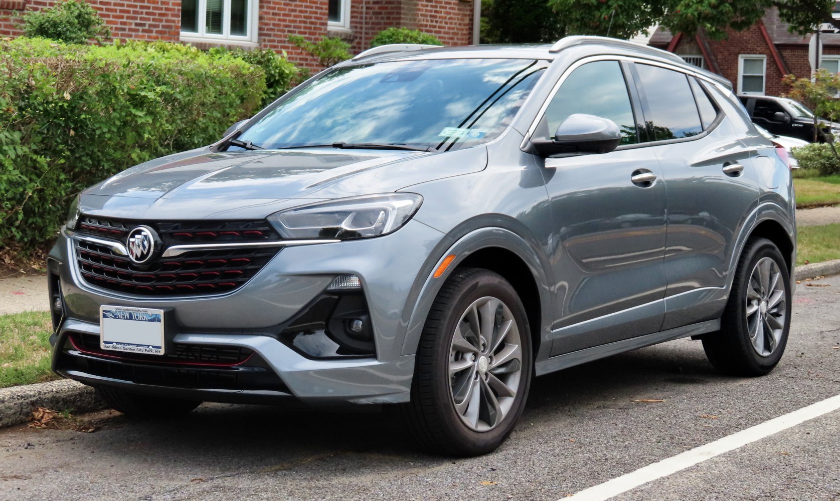 Gray SUV with LED headlights and distinctive front grille