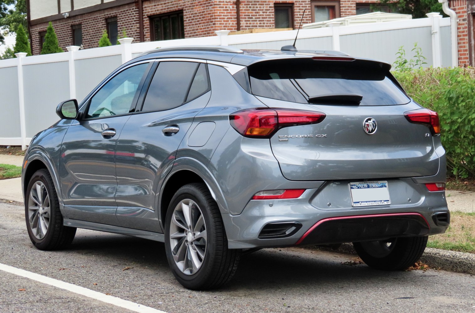 Rear view of a compact SUV with tinted windows and distinctive taillights