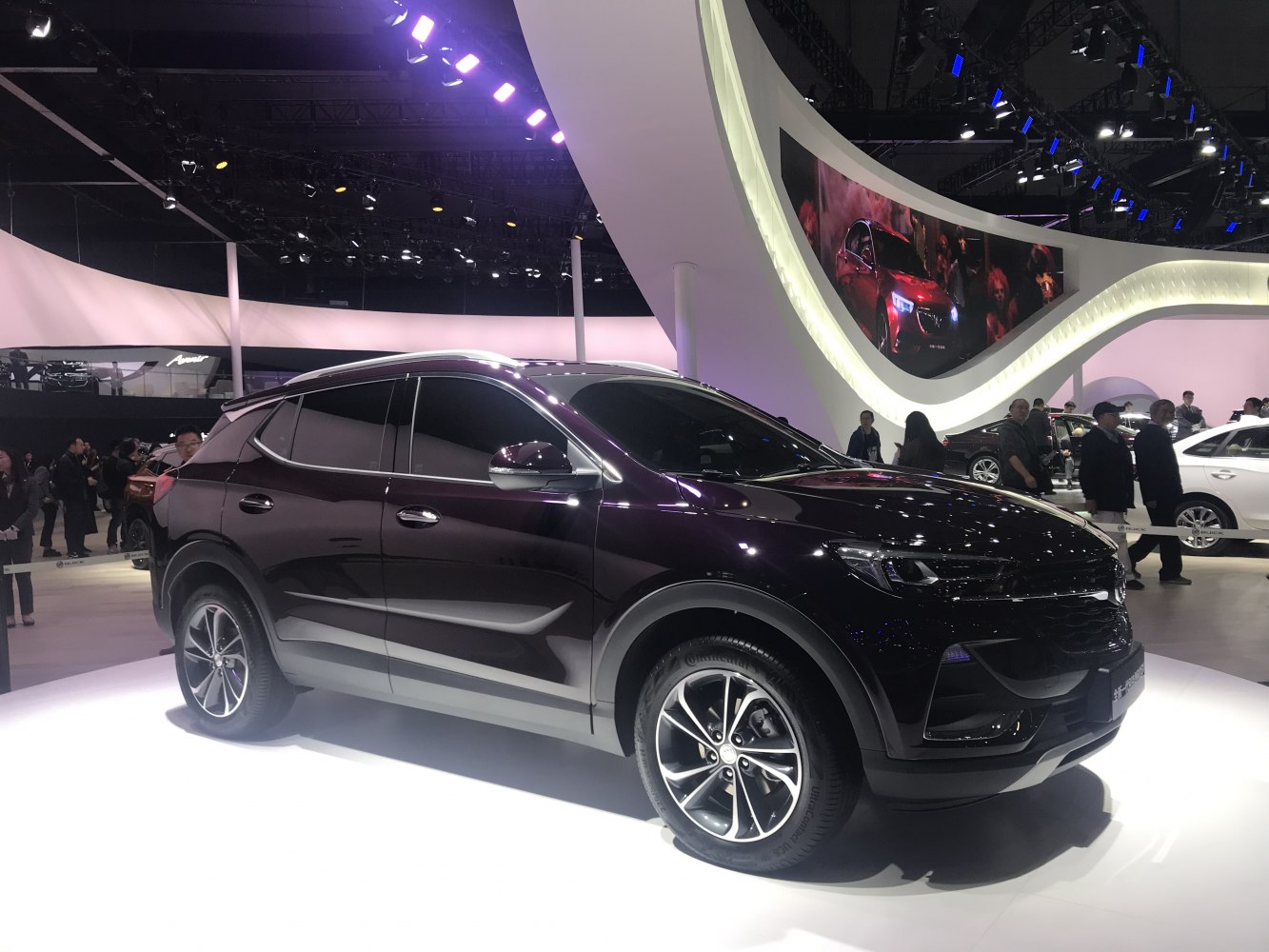 Modern SUV with glossy dark finish and stylish alloy wheels