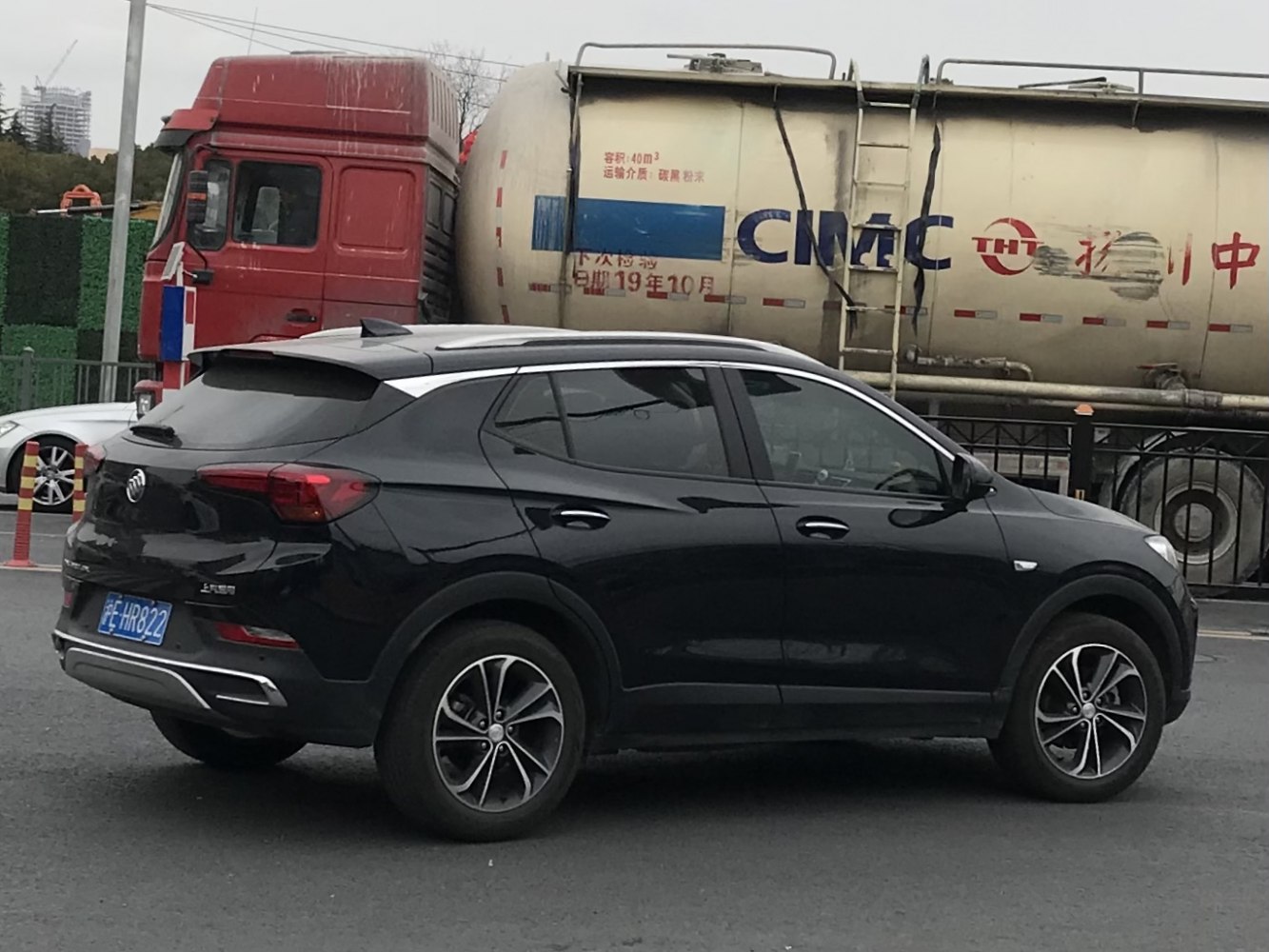 Black SUV side profile with alloy wheels and tinted windows