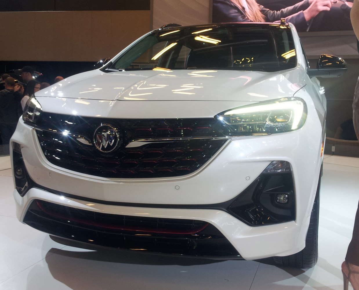Front grille with illuminated LED headlights and bumper details