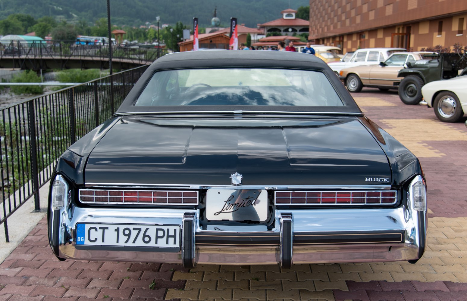 Rear view with classic tail lights and chrome bumper