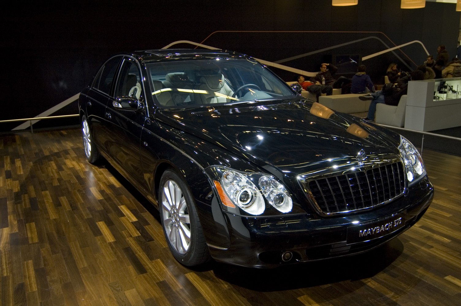 Luxury sedan with chrome grille and projector headlights