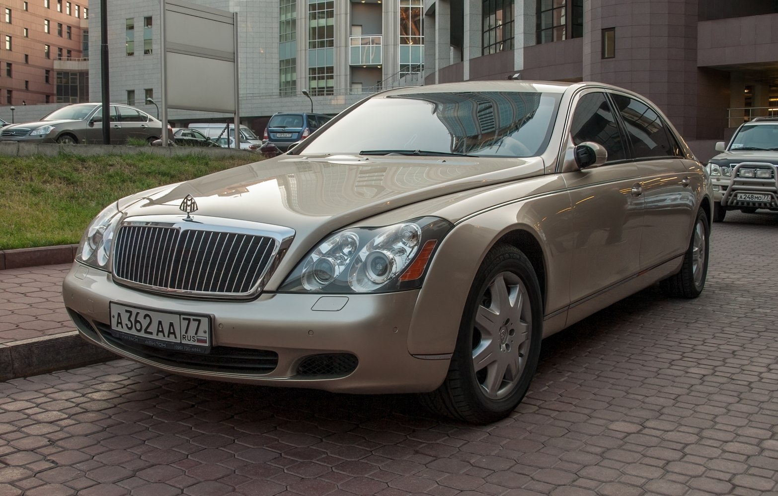 Luxury sedan front view with distinctive grille and headlights