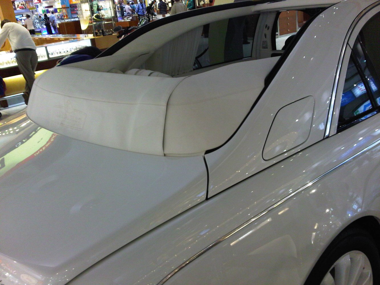 Close-up of a convertible rear section with soft top cover