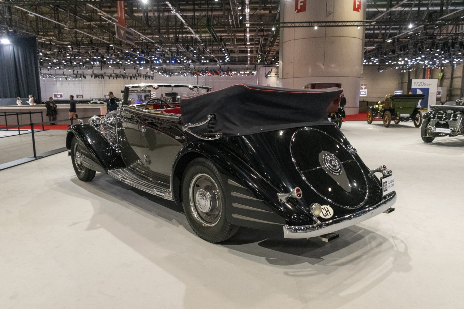 Classic vintage convertible with folding soft top and elegant rear design