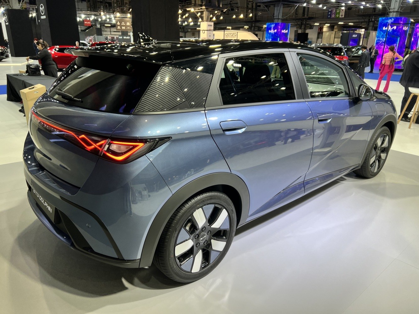 Rear side profile with illuminated LED tail lights and alloy wheels