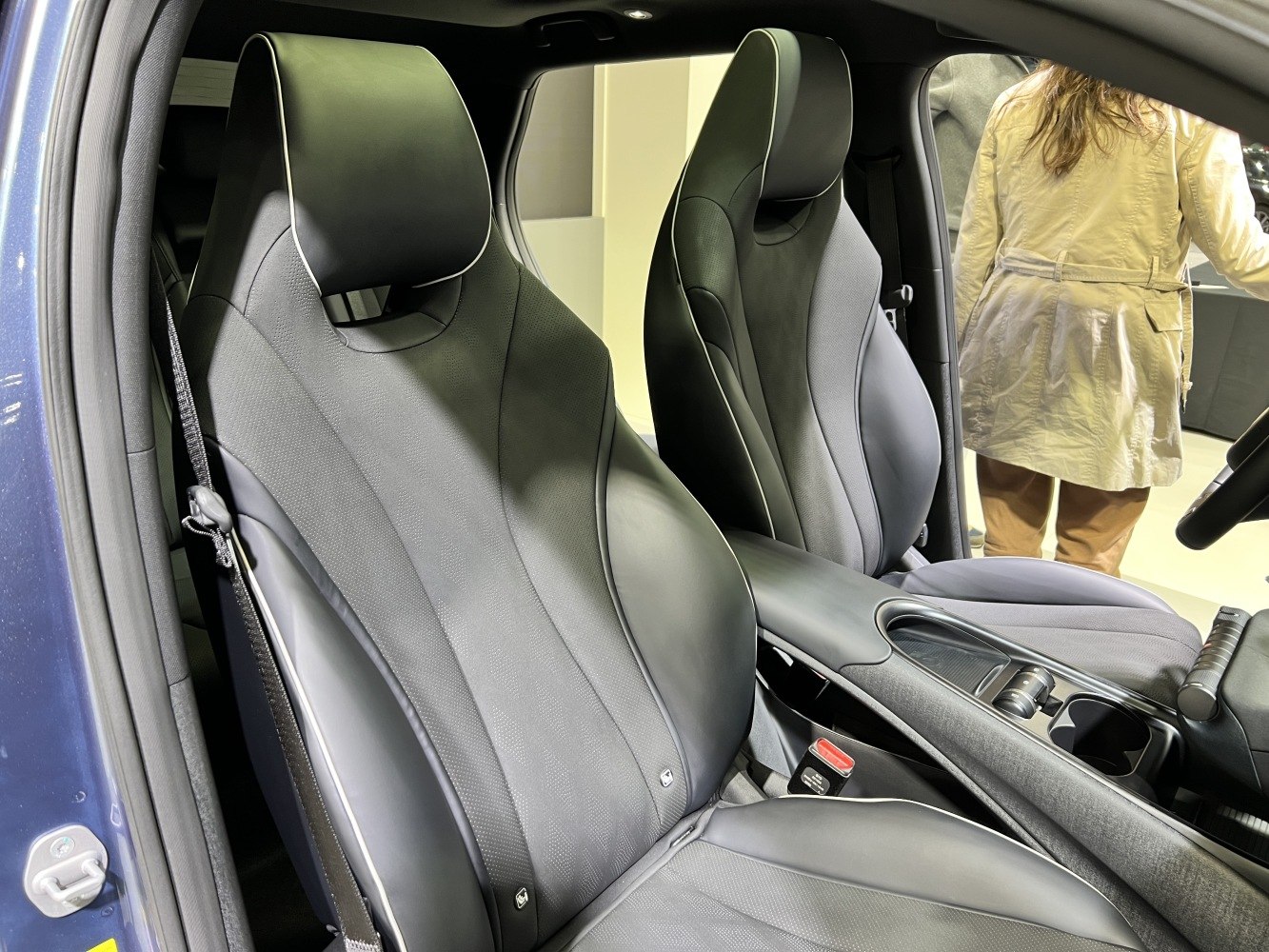 Modern front seats and center console in a car interior