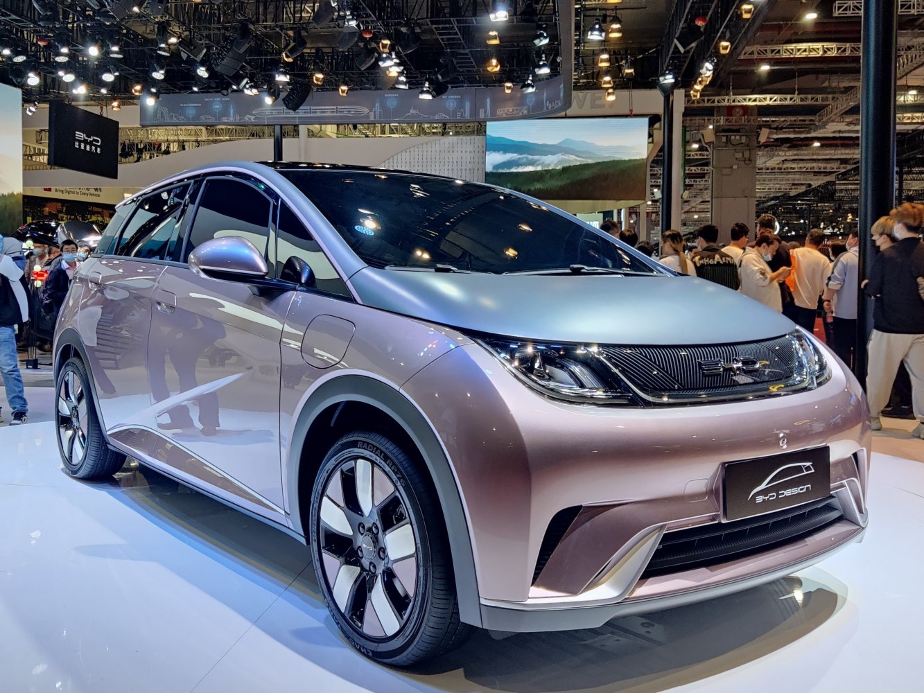 Front view of an electric compact hatchback with sleek headlights and aerodynamic lines
