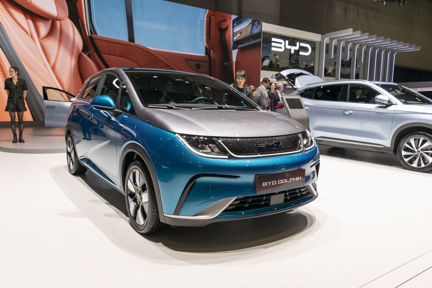 Blue and silver electric hatchback front with LED headlights