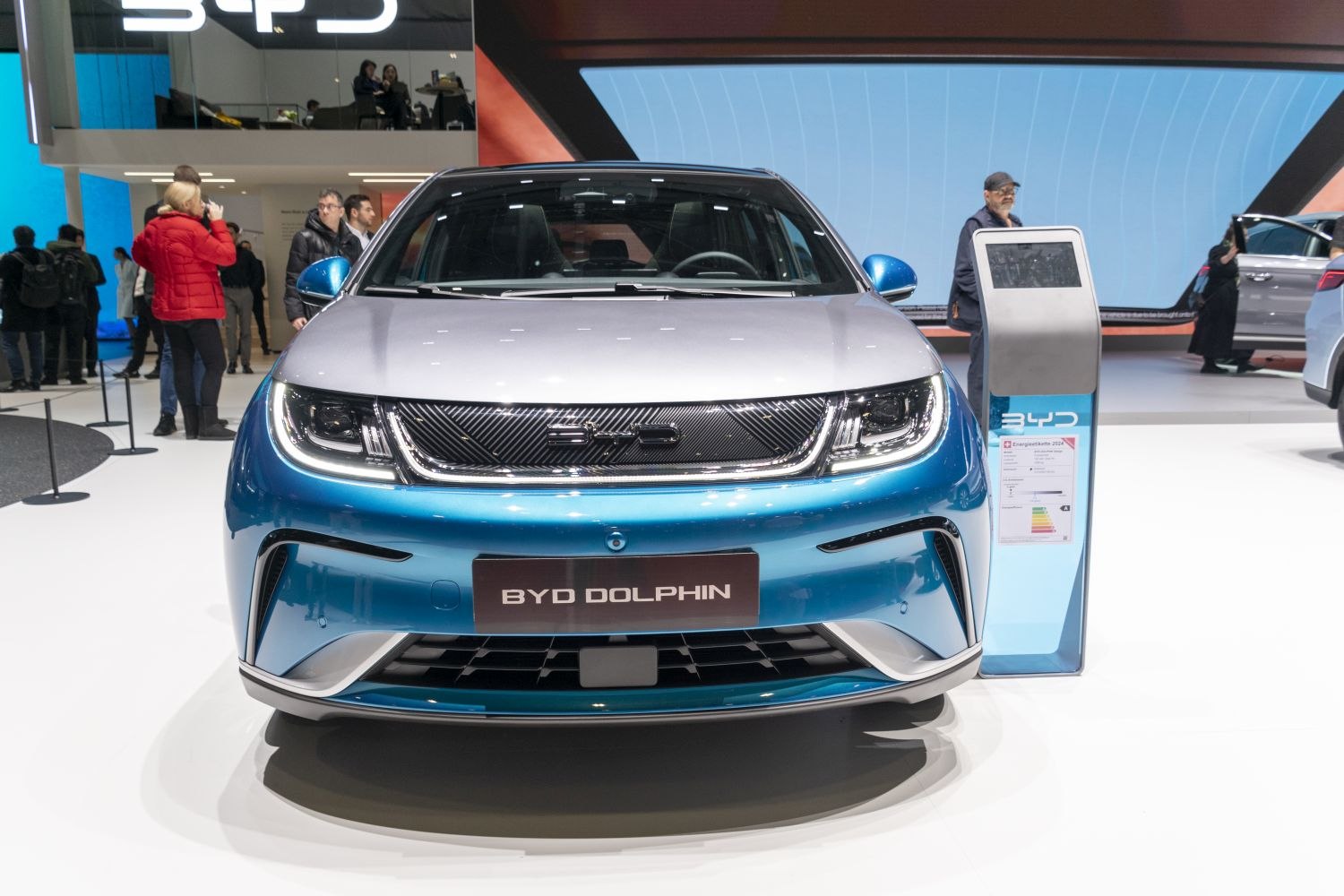 Front view displaying sleek headlights and distinct grille design