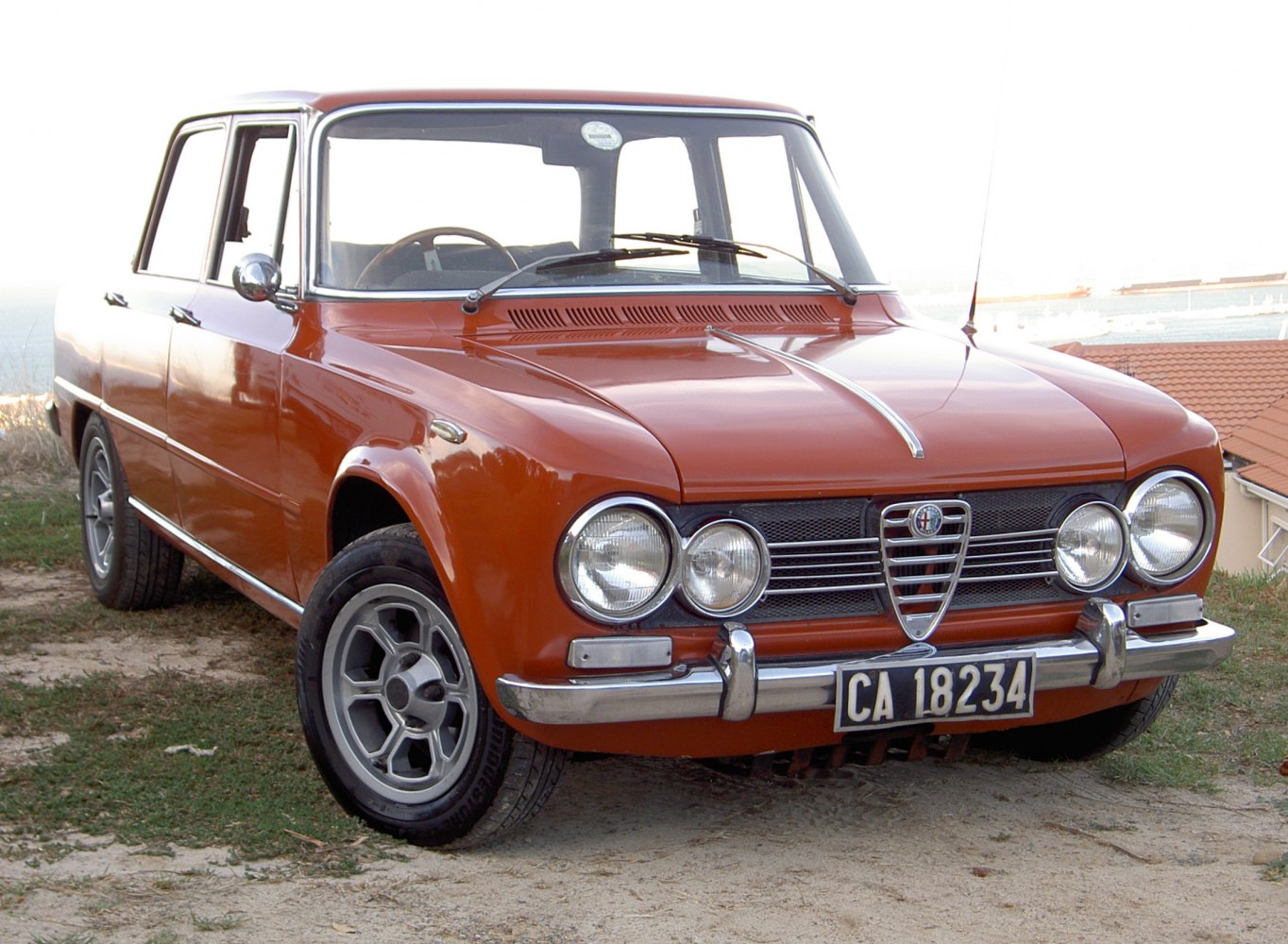Classic sedan with dual round headlights and a prominent front grille.