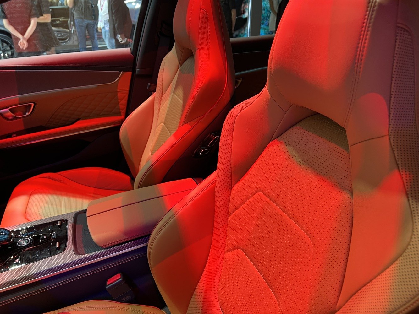 Luxury beige leather perforated sport seats and center console