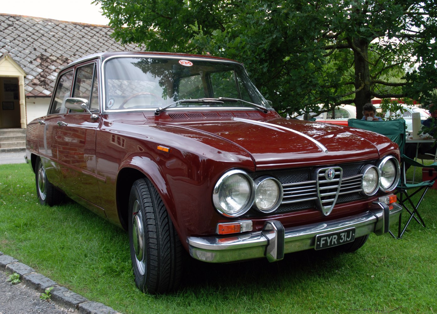Classic front grille with quad round headlights and chrome bumper