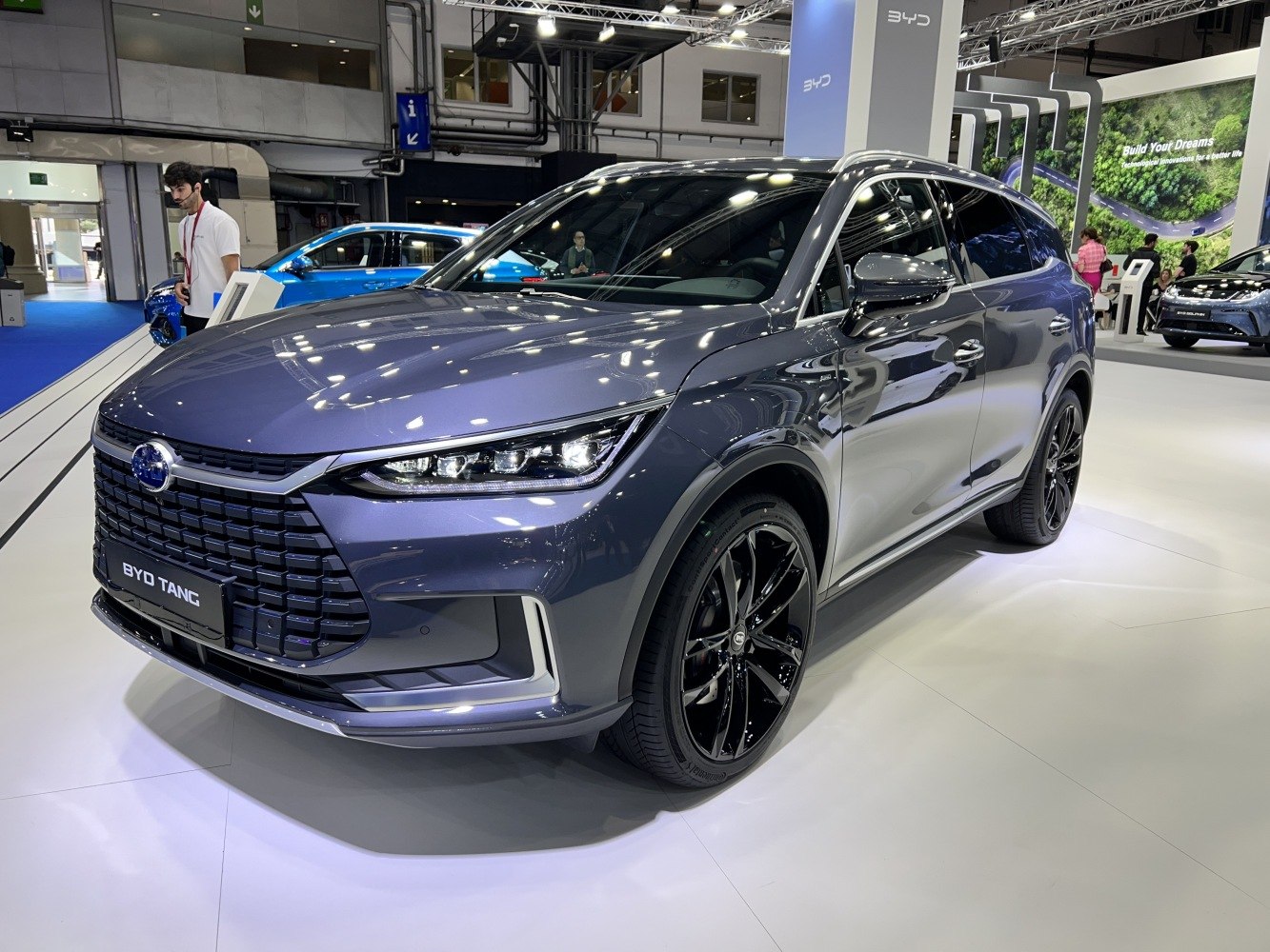 Modern LED headlights and glossy black alloy wheels on a sleek SUV.