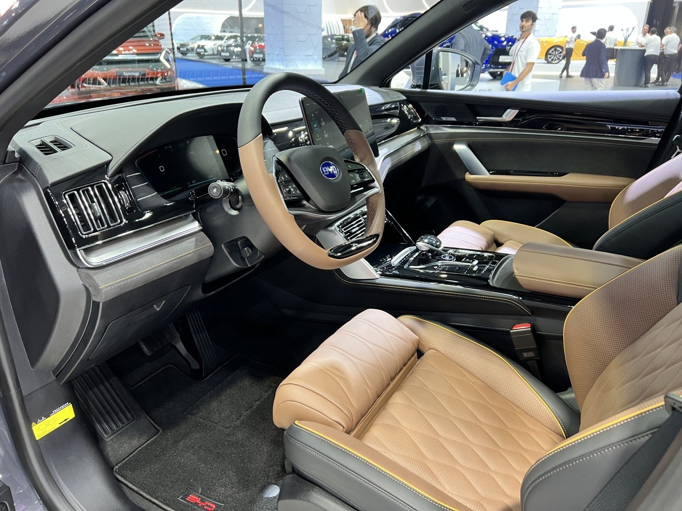 Dual-tone steering wheel and quilted premium seats in car interior