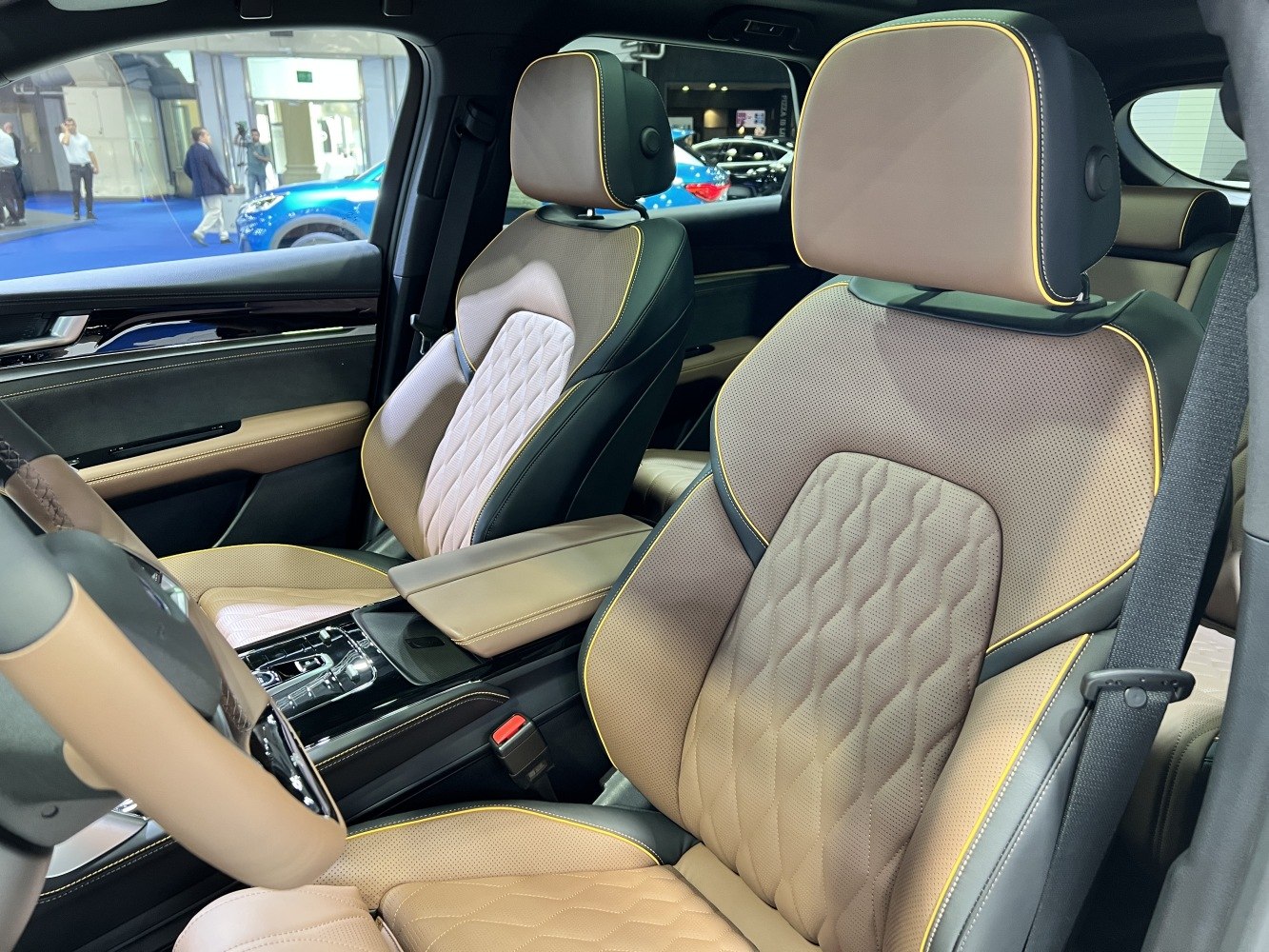 Luxury quilted car seats with yellow contrast stitching