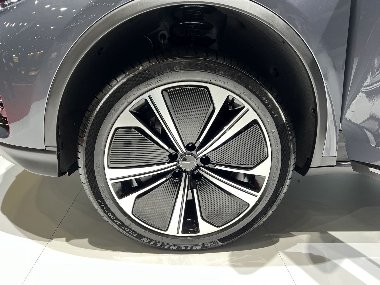 Close-up of a Michelin tire and a modern multi-spoke alloy rim